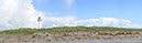 %_tempFileNamelighthouse%20with%20dunes%